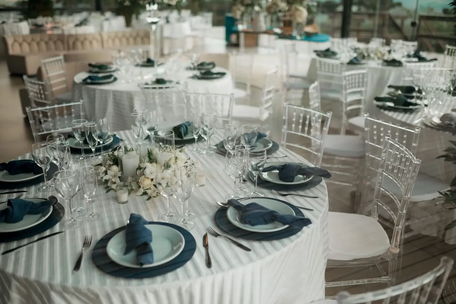 Guests raising glasses at dusk.